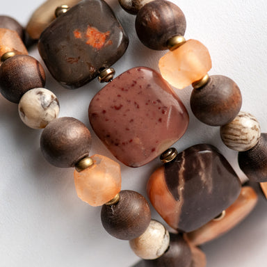 Safari Jasper, Graphic Feldspar, Olive Wood and Recycled glass in a handmade beaded bracelet