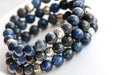 Stack of Beautiful A-grade blue sodalite stretch bracelets for sale separately. Handmade in New Brunswick Canada