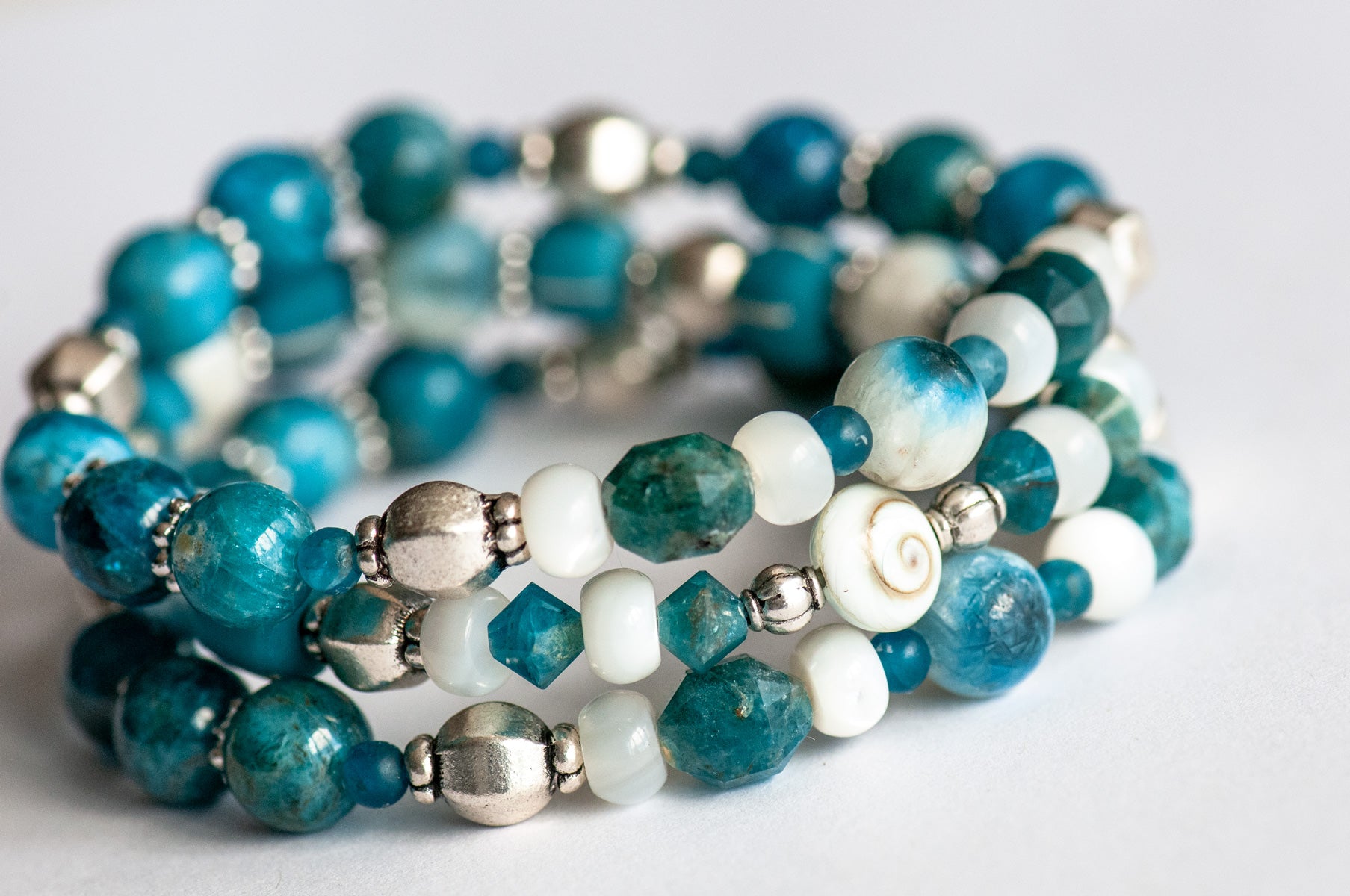Apatite, Shiva Eye, Mother of Pearl, and Blue Eye Quartz bracelet set handmade in Canada