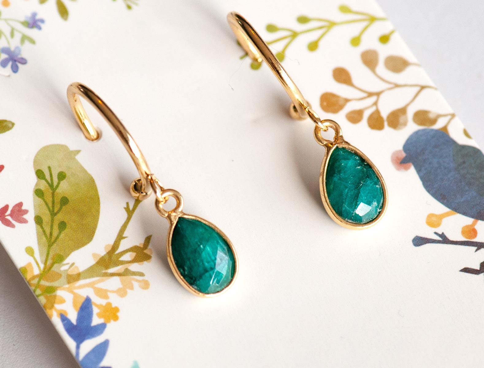 Gold bezel Emerald earrings for May birthstone