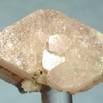 Zektzerite: Value, Uses, and Jewelry Tips