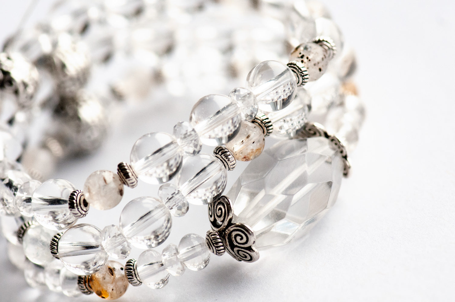 Insightful Lynx bracelet set with Quartz crystal and biotite gemstones