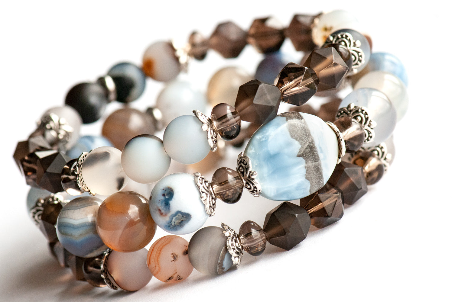 Three-bracelet set featuring blue Opal, smokey quartz and agates handmade in Canada