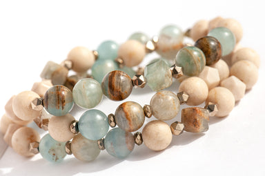 Sandy Shores mala-style triple wrap bracelet with Lemurian Aquitaine Calcite and petrified wood beads in soothing soft blues and beiges