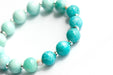 Amazonite ombre bracelet with silver hematite and conch shell spacers handmade in New Brunswick Canada