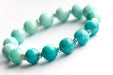 Amazonite ombre bracelet with silver hematite and conch shell spacers handmade in New Brunswick Canada