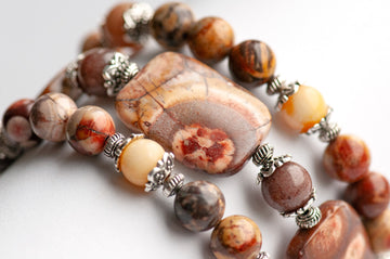 'The Enchanted Forest Trio' – a handcrafted bracelet set with Birds Eye Rhyolite, yellow Burmese Jade & purple aventurine