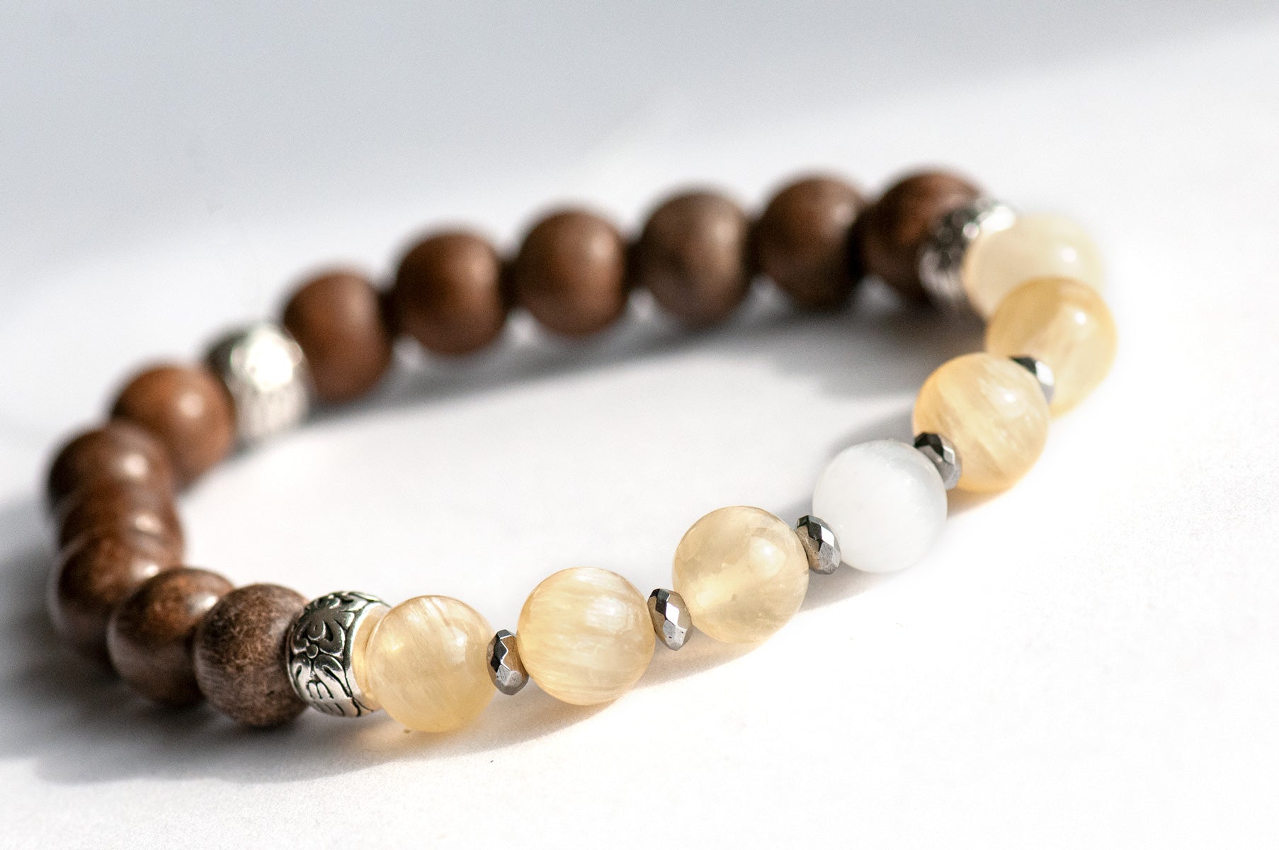 Selenite Serenity yellow selenite, hematite, and wood bracelet handmade in Canada