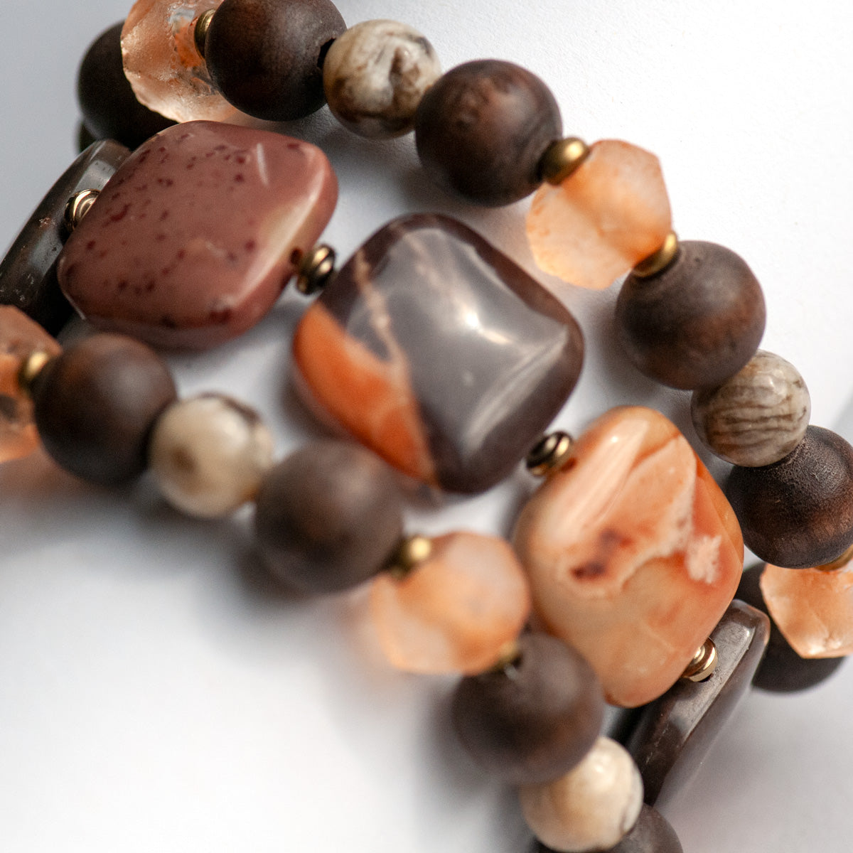 Safari Jasper, Graphic Feldspar, Olive Wood and Recycled glass in a handmade beaded bracelet