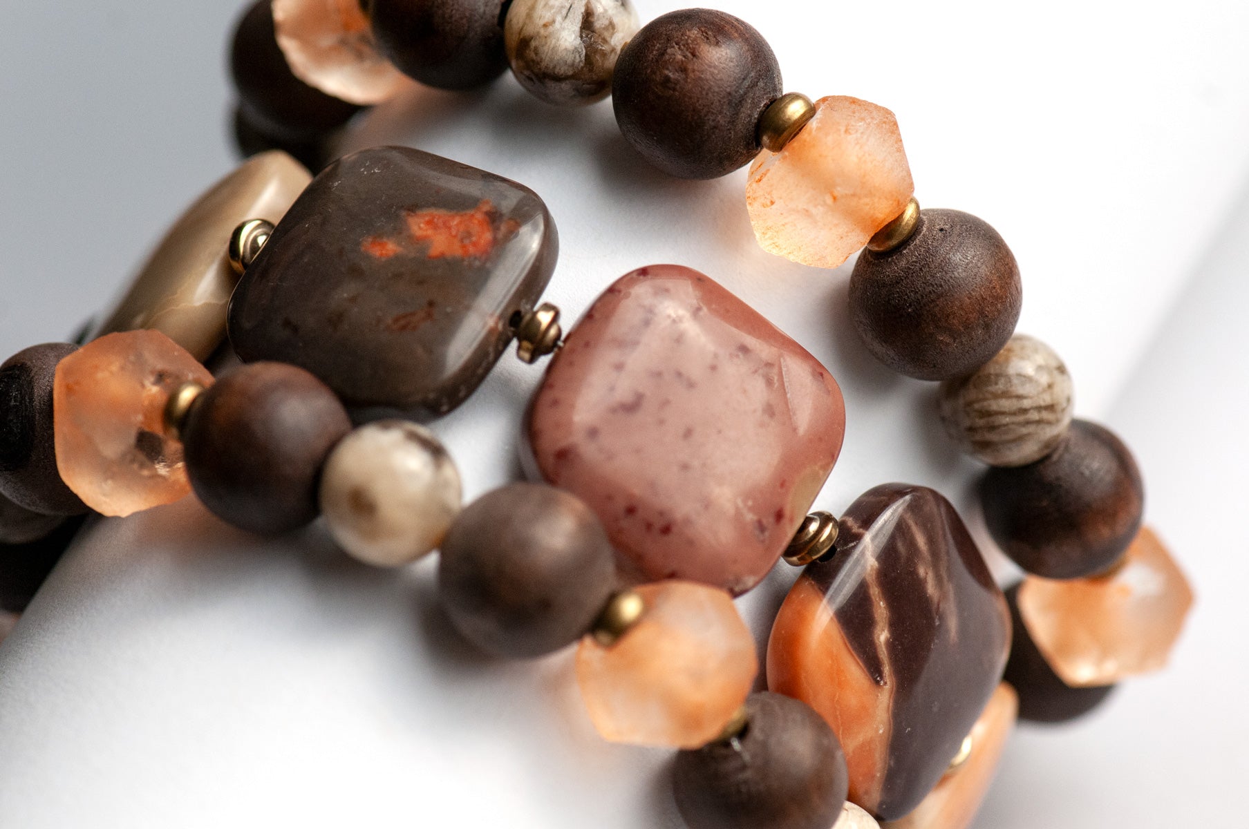 Safari Jasper, Graphic Feldspar, Olive Wood and Recycled glass in a handmade beaded bracelet