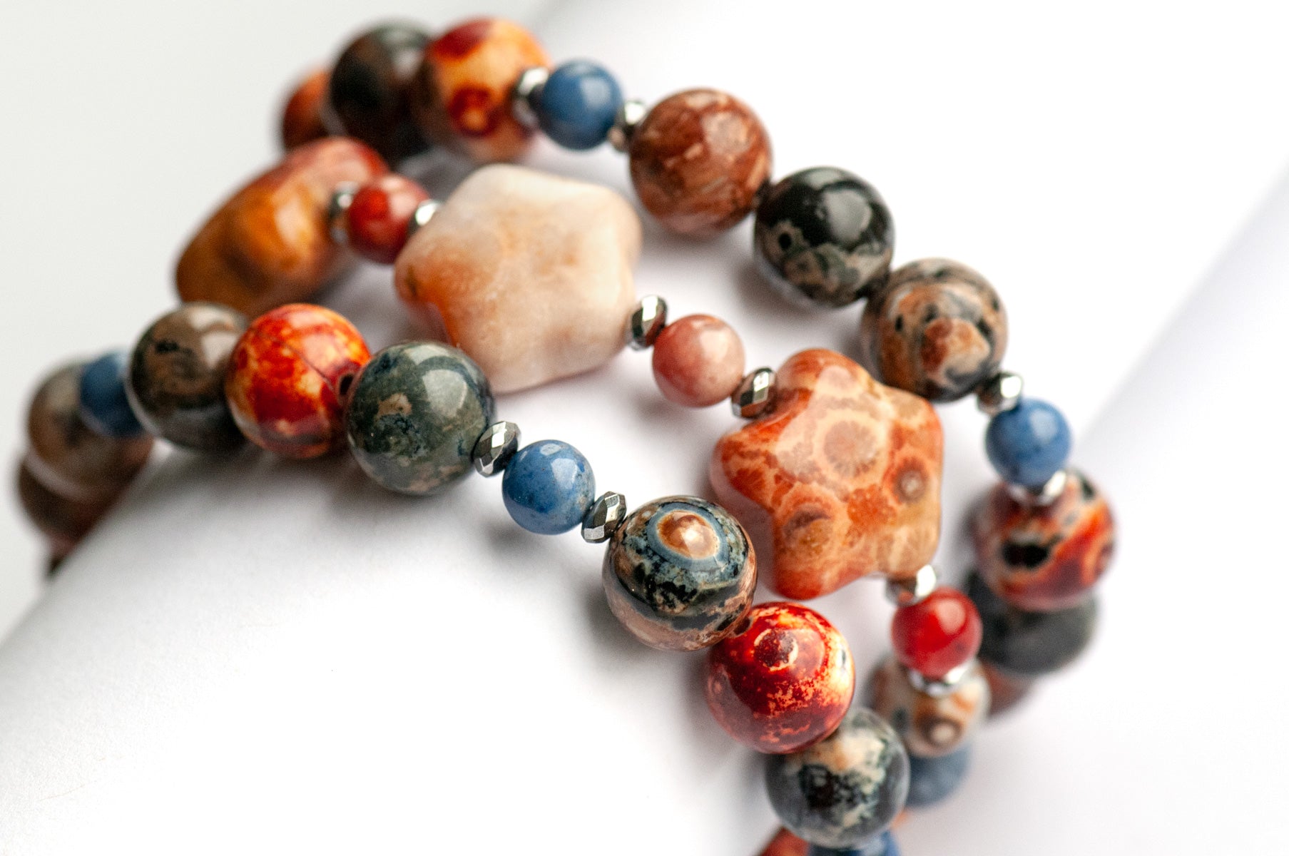 Handmade gemstone bracelet set of two featuring fossil coral, agate, hematite, and dumortierite  with an extra add-on bracelet