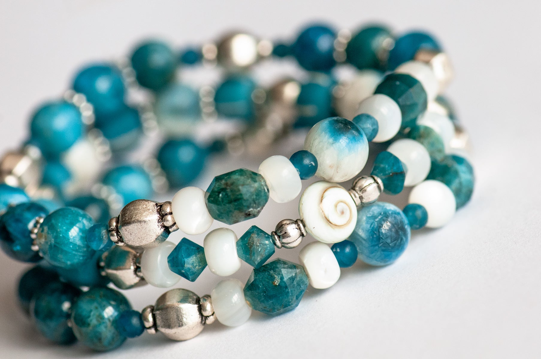 Apatite, Shiva Eye, Mother of Pearl, and Blue Eye Quartz bracelet set handmade in Canada