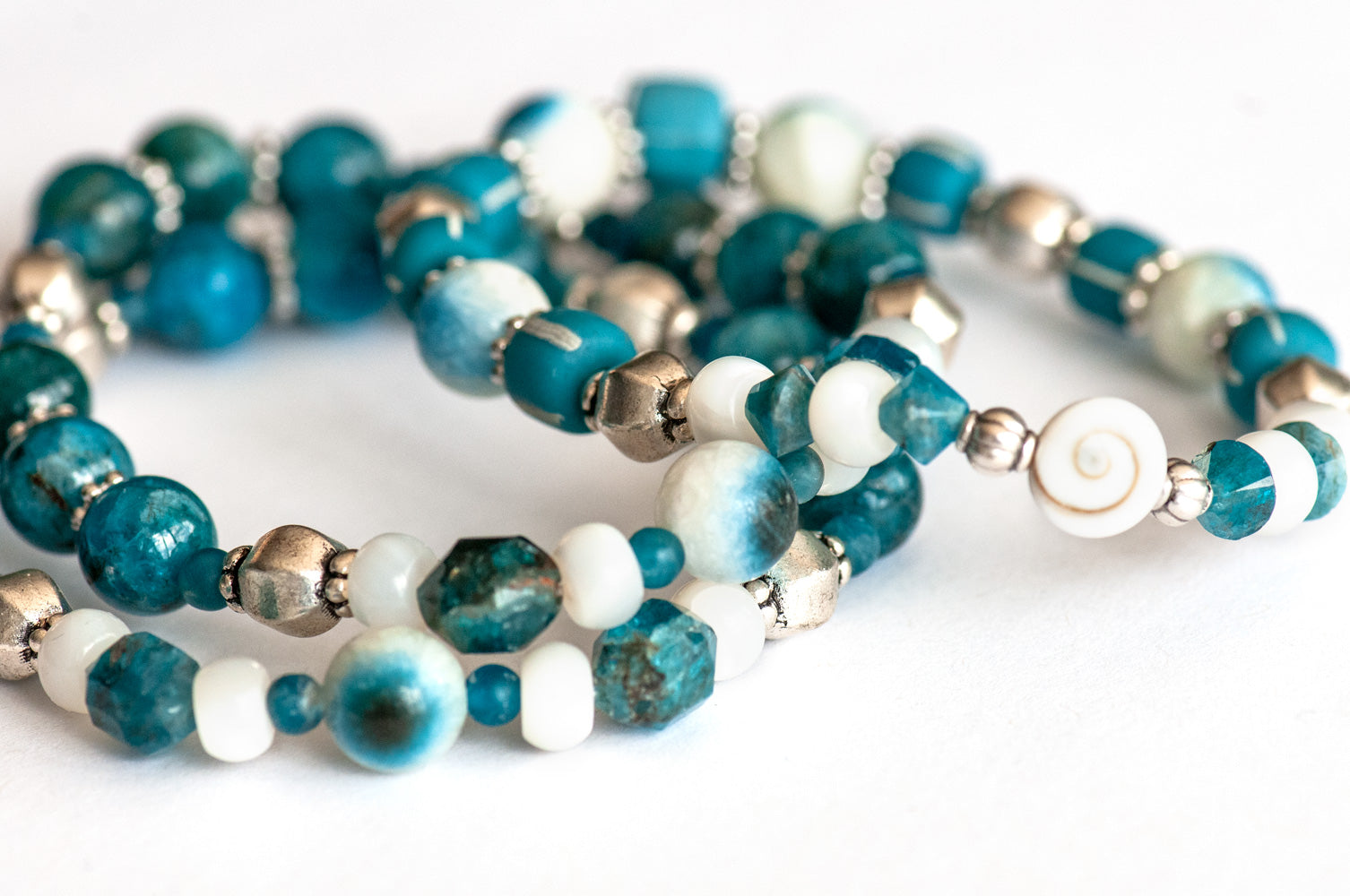 Apatite, Shiva Eye, Mother of Pearl, and Blue Eye Quartz bracelet set handmade in Canada