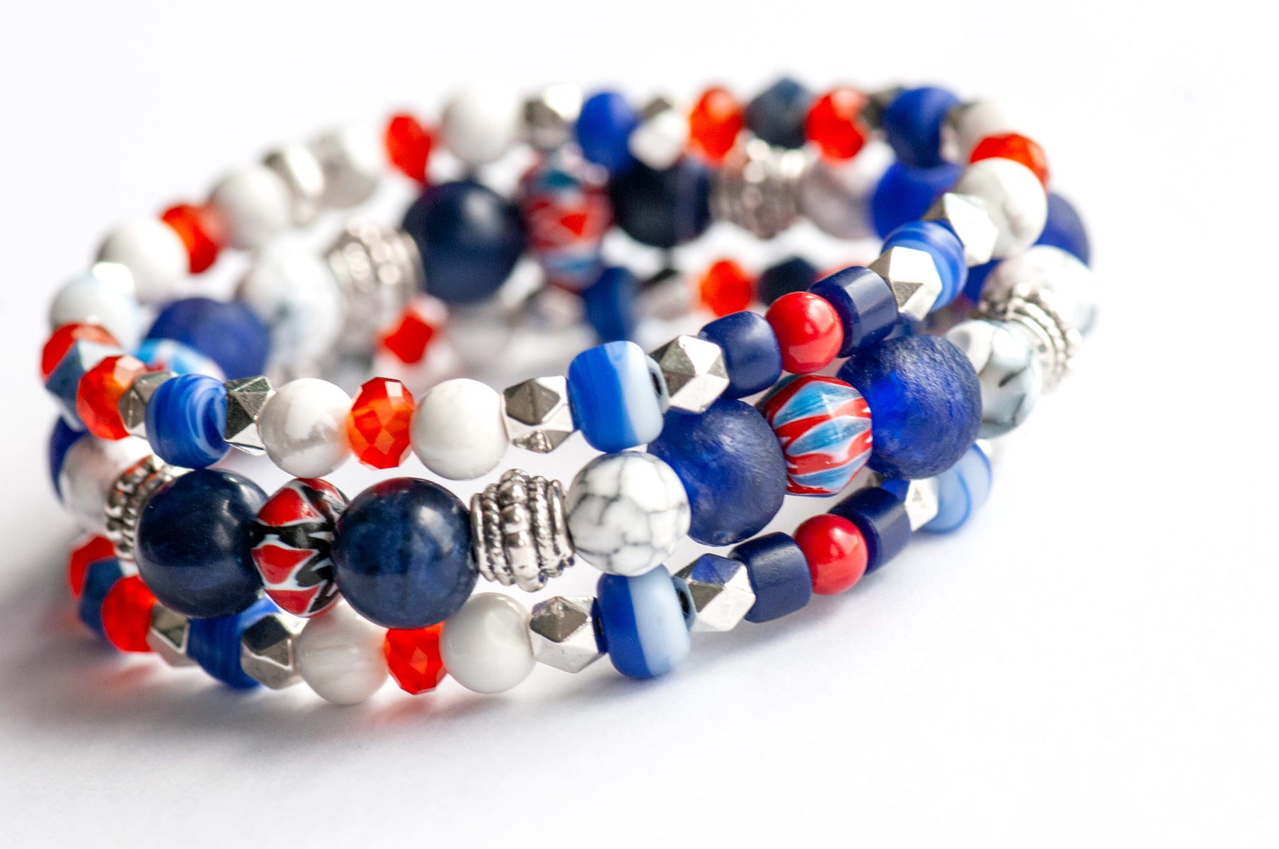 Vibrant Nautical Lynx bracelet set featuring red, white, and blue glass Chevron beads, cobalt blue recycled glass, AA-Grade Sodalite, Howlite rounds, and Tibetan silver spacers