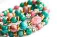 Fierce Compassion bracelet set featuring vibrant pink Thulite, turquoise Crazy Lace Calcite, dark turquoise Russian Amazonite, deep pink Rhodonite, crystal quartz, and gold accents