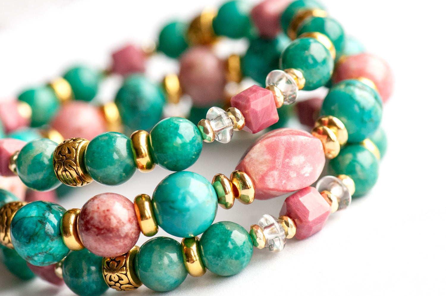 Fierce Compassion bracelet set featuring vibrant pink Thulite, turquoise Crazy Lace Calcite, dark turquoise Russian Amazonite, deep pink Rhodonite, crystal quartz, and gold accents