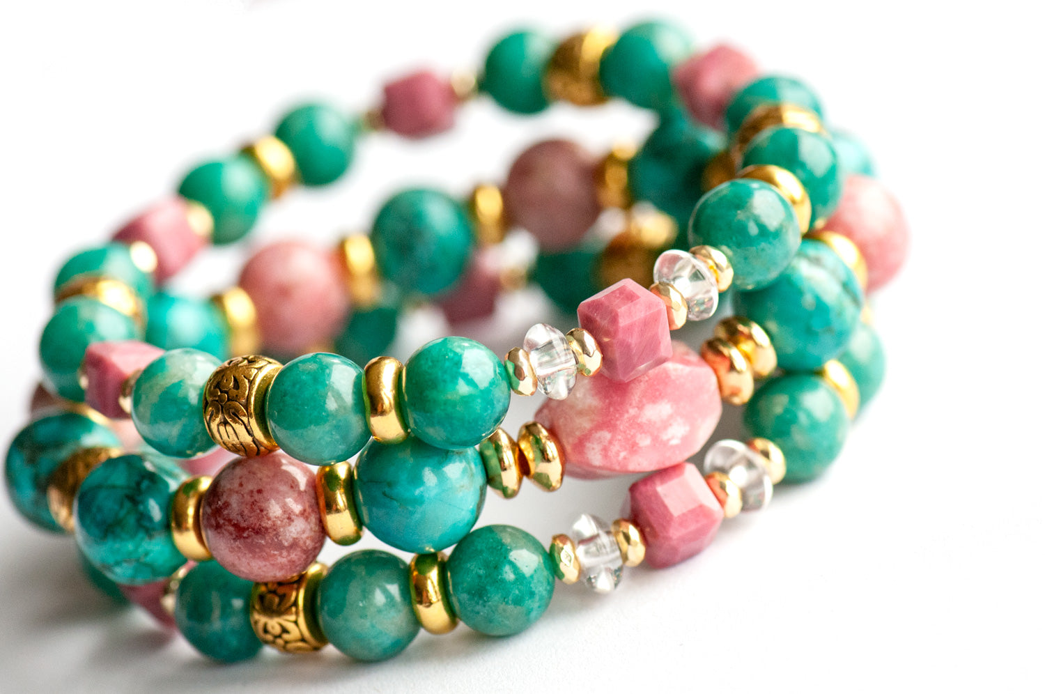 Fierce Compassion bracelet set featuring vibrant pink Thulite, turquoise Crazy Lace Calcite, dark turquoise Russian Amazonite, deep pink Rhodonite, crystal quartz, and gold accents