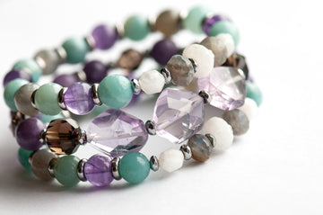 Fierce Healing bracelet set featuring lavender amethyst, smokey quartz, blue amazonite, deep purple amethyst, labradorite, and blue moonstone with hematite and stainless steel accents