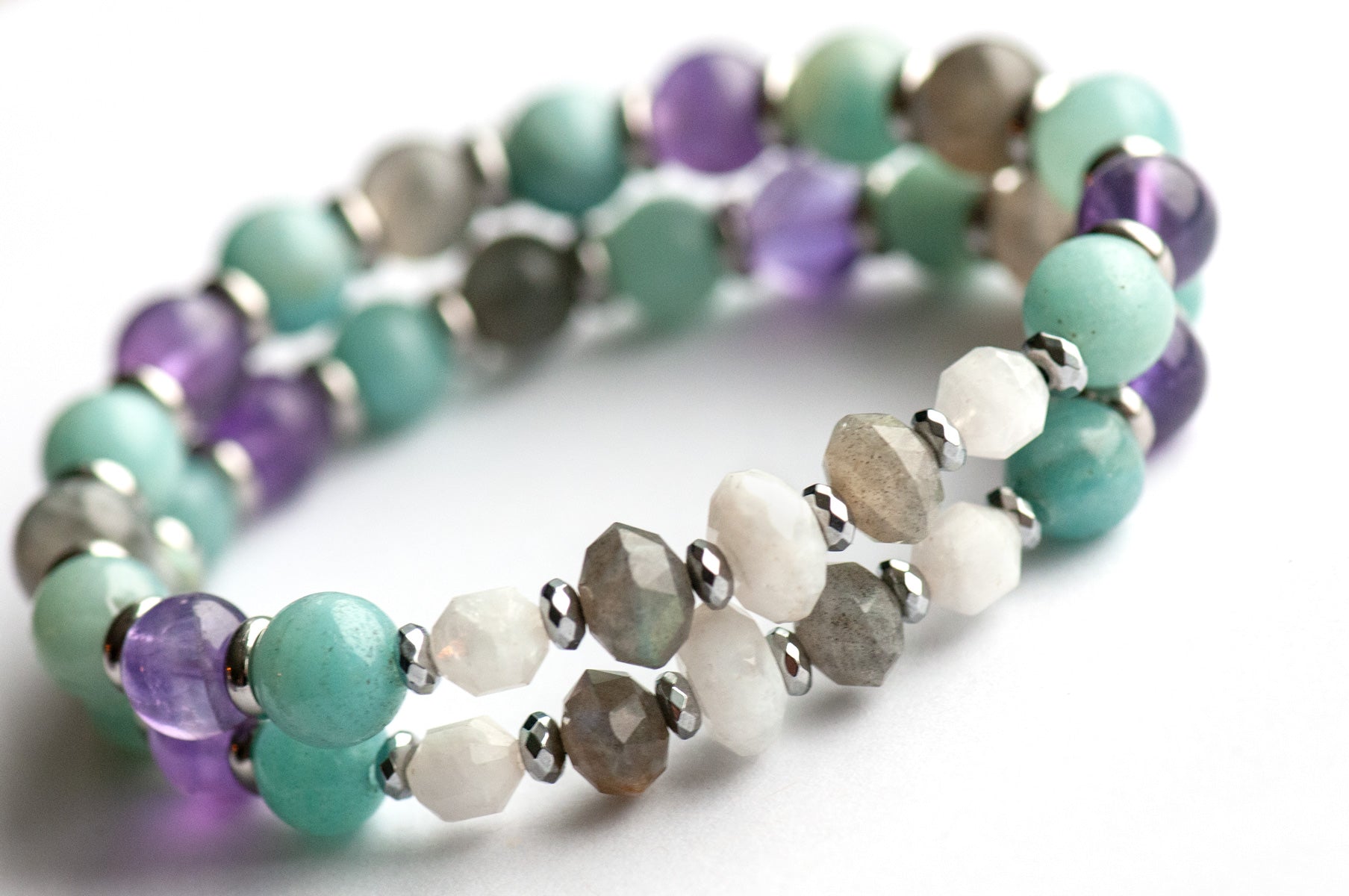 Fierce Healing bracelet set featuring lavender amethyst, smokey quartz, blue amazonite, deep purple amethyst, labradorite, and blue moonstone with hematite and stainless steel accents