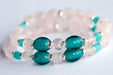 Fierce Affection bracelet set featuring Amazonite and Rose Quartz beads with turquoise white heart glass tube beads and silver-plated Hematite accents