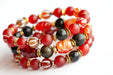 Fierce Empowerment bracelet set featuring Carnelian, Golden Obsidian, and Dzi Agate