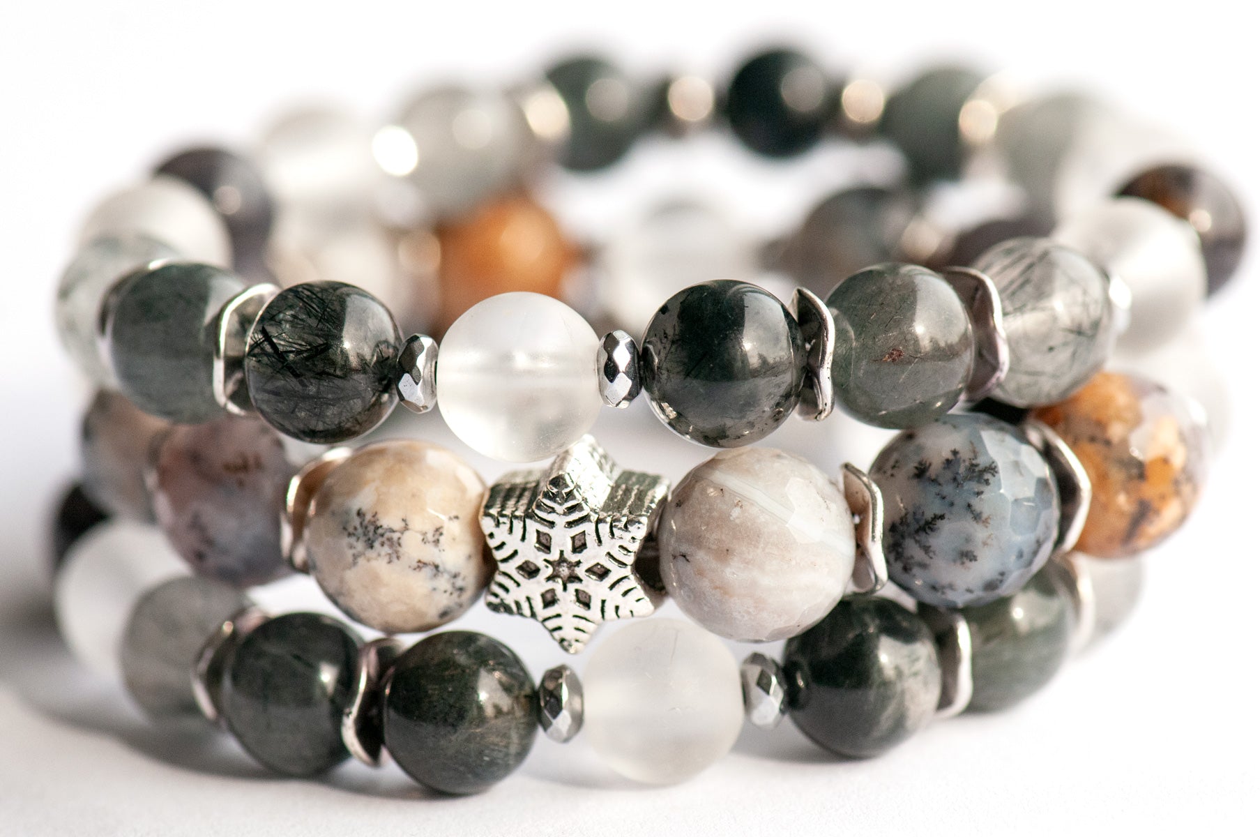 Frosted Lynx winter-themed gemstone bracelet set with silver spacers