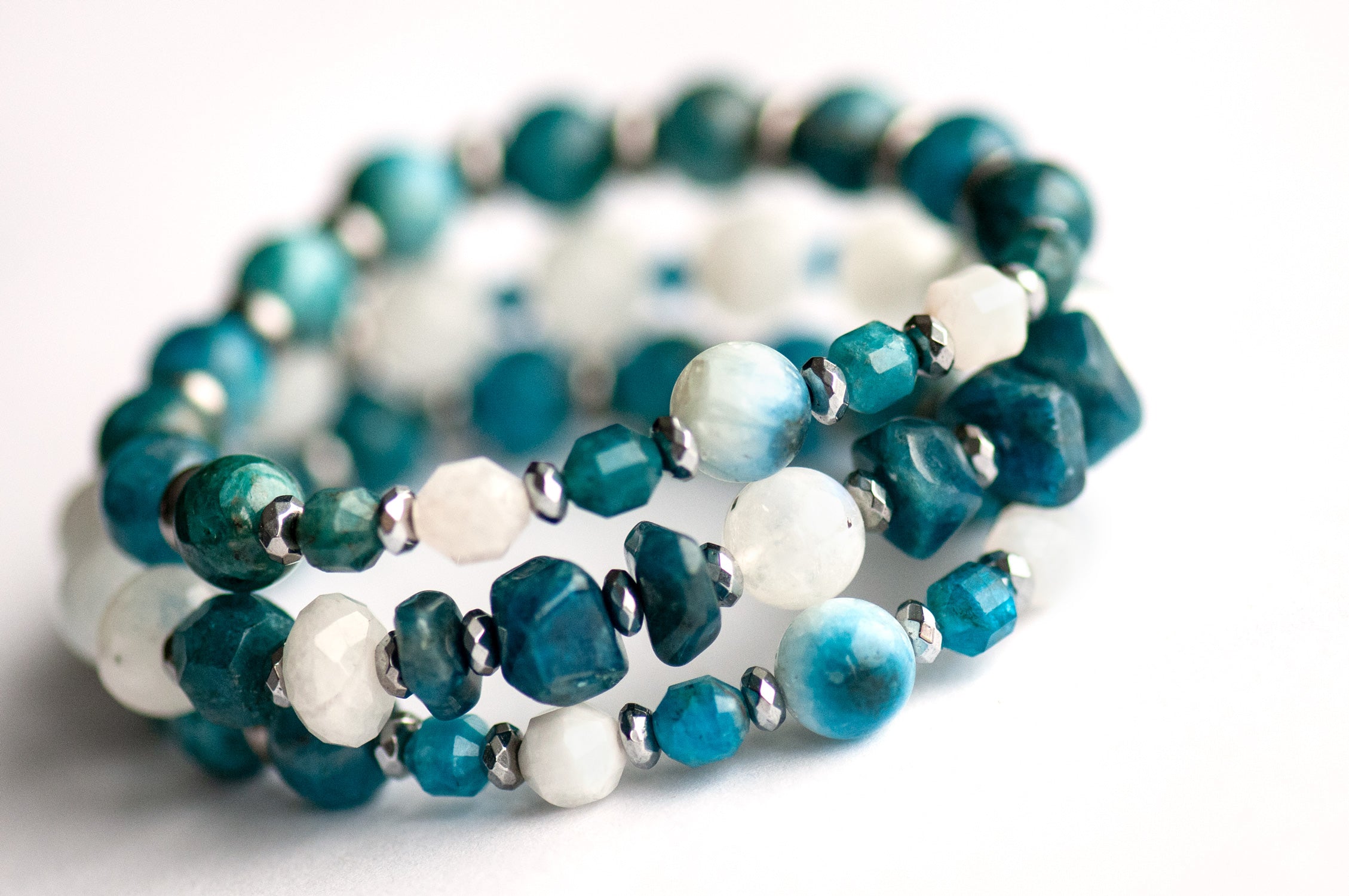 Fierce Expression bracelet set with deep blue Apatite, Rainbow Moonstone, and Blue Eye Quartz.