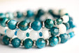 Close-up of Apatite chips and Rainbow Moonstone focal bead in the Fierce Expression bracelet.