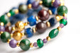 Festive Lynx bracelet set featuring Malachite focal bead with Lepidolite and Mica rounds.