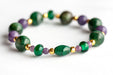 Festive Lynx bracelet set featuring Malachite focal bead with Lepidolite and Mica rounds.