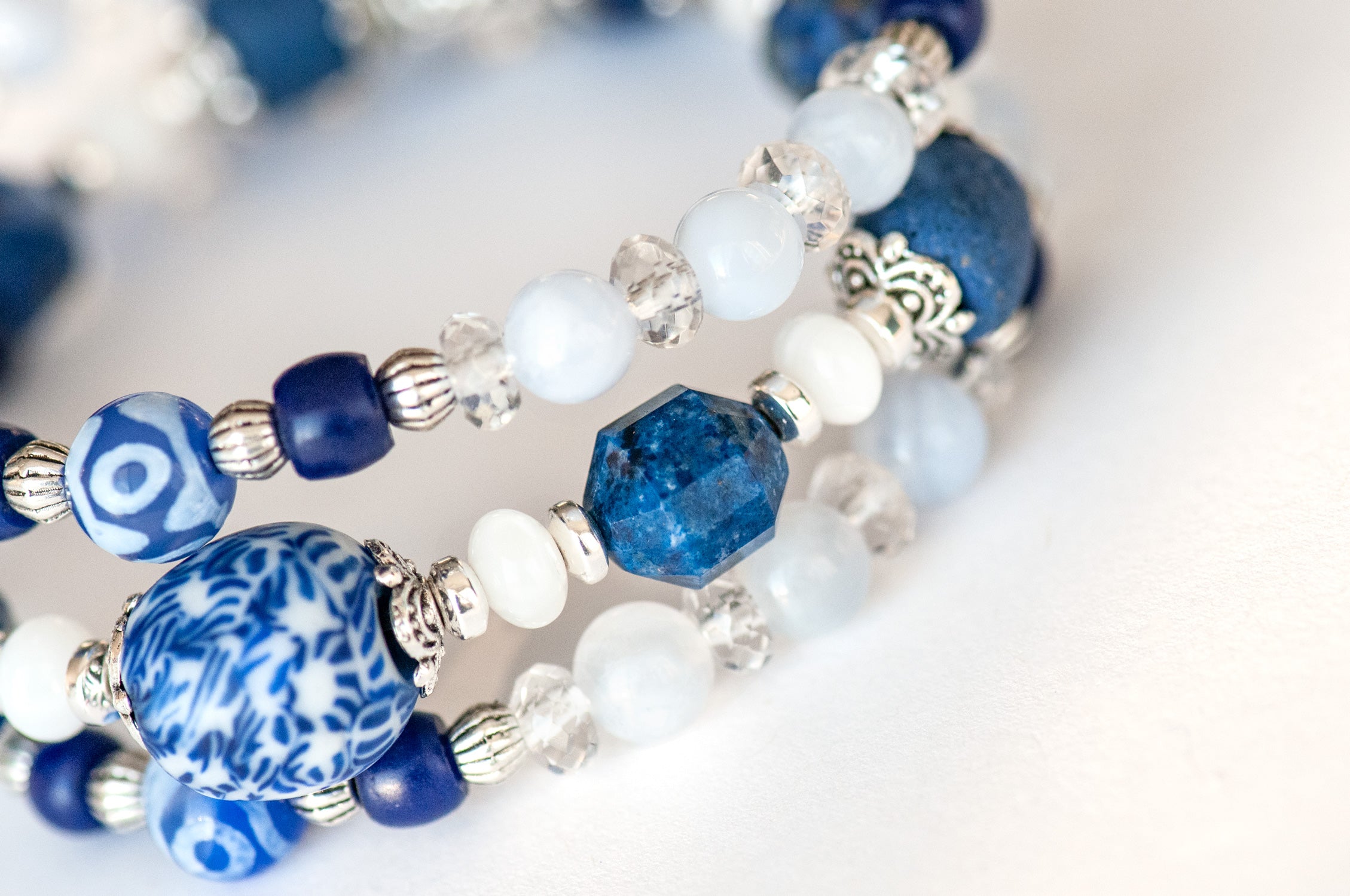 Close-up of Lapis energy prisms and blue lace agate in the Winter Sky bracelet set.