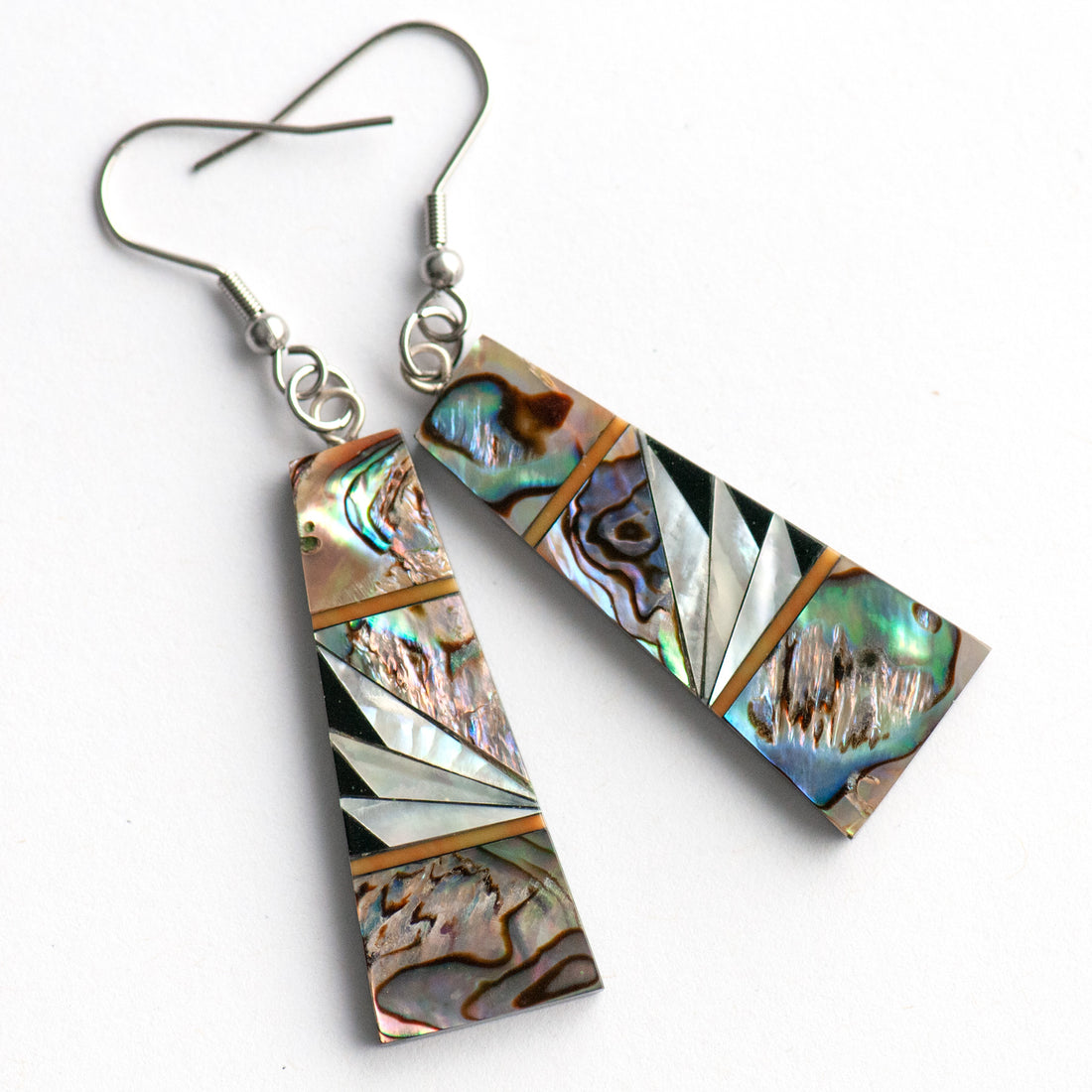 Abalone & Mother of Pearl Drop Earrings with shimmering silver, blue, and green abalone, creamy Mother of Pearl, and orange coral inlays on a black resin back.