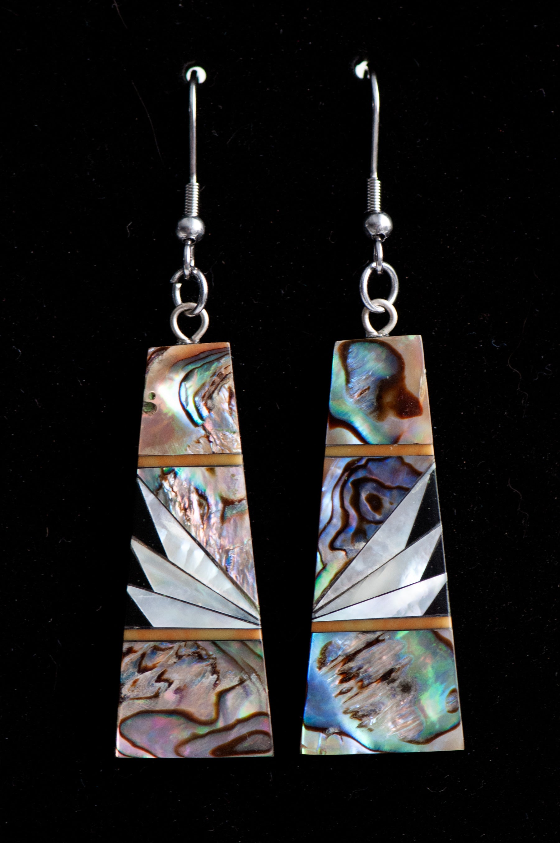 Abalone & Mother of Pearl Drop Earrings with shimmering silver, blue, and green abalone, creamy Mother of Pearl, and orange coral inlays on a black resin back.