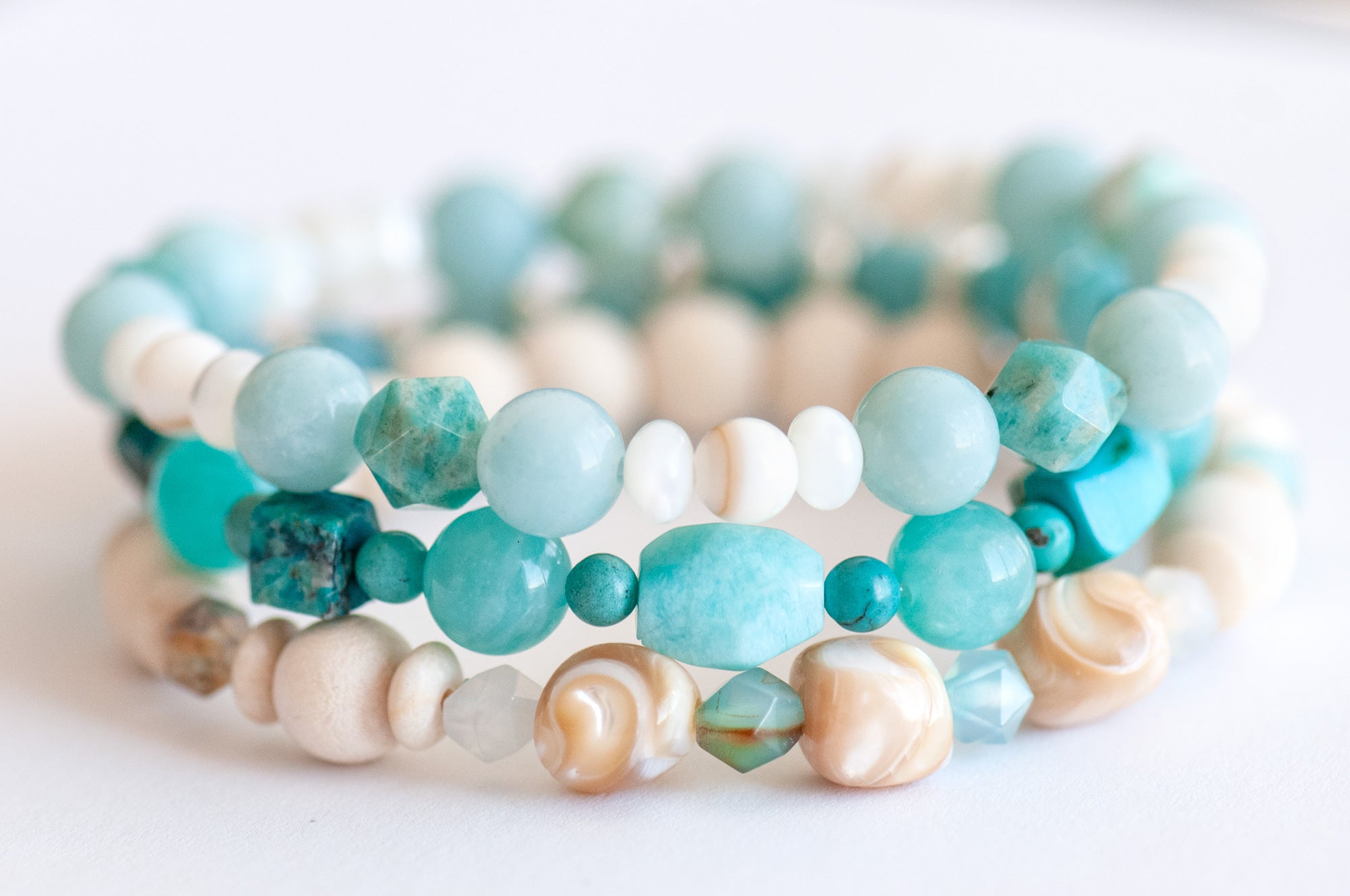 Voyage to Cuba bracelet set featuring Amazonite, Chrysocolla, Fossil Stone, and Trocca Shell, inspired by the beaches, sea, and sky of Cayo Cruz. A tropical escape in gemstone form.