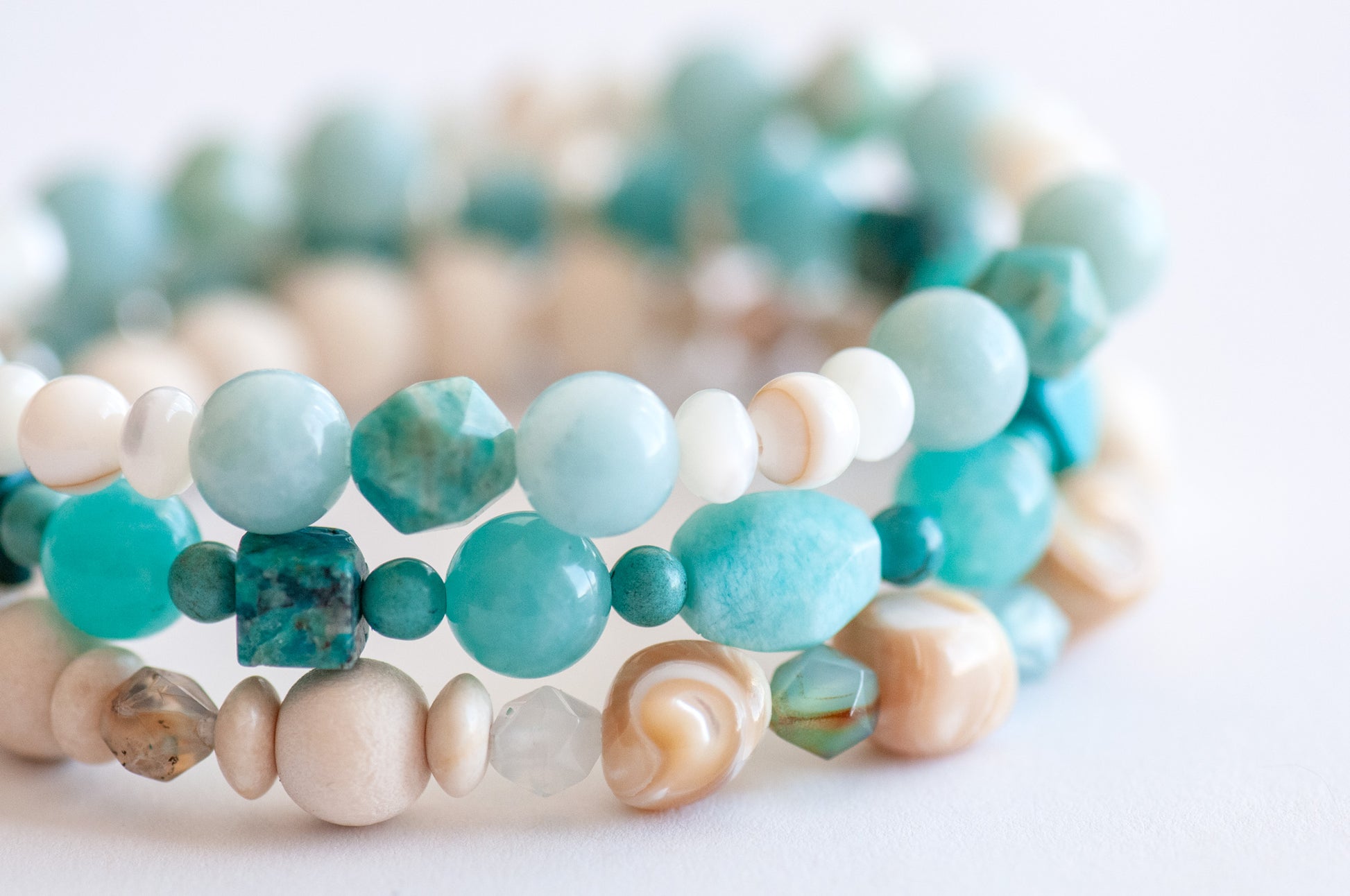 Voyage to Cuba bracelet set featuring Amazonite, Chrysocolla, Fossil Stone, and Trocca Shell, inspired by the beaches, sea, and sky of Cayo Cruz. A tropical escape in gemstone form.
