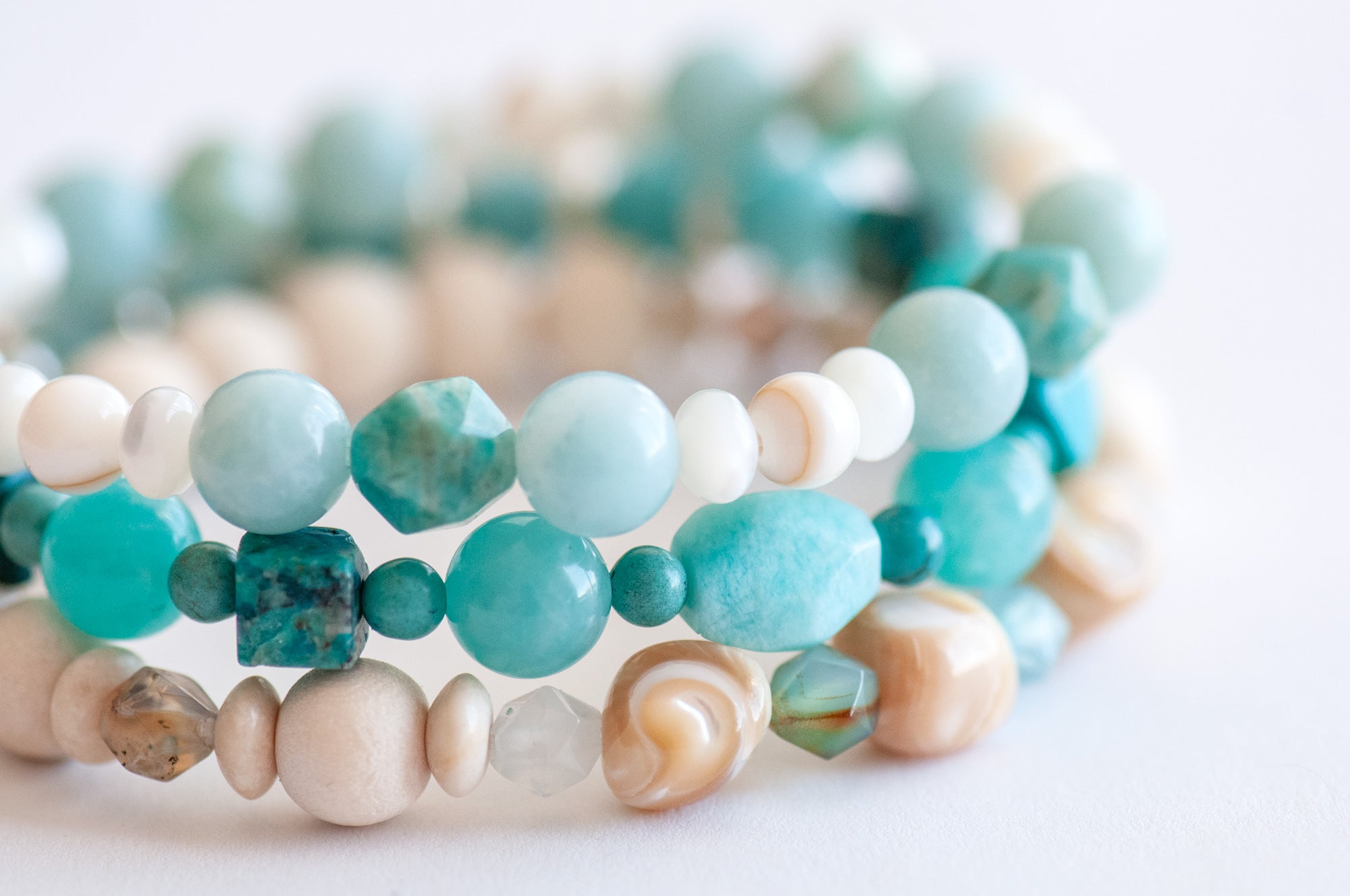 Voyage to Cuba bracelet set featuring Amazonite, Chrysocolla, Fossil Stone, and Trocca Shell, inspired by the beaches, sea, and sky of Cayo Cruz. A tropical escape in gemstone form.
