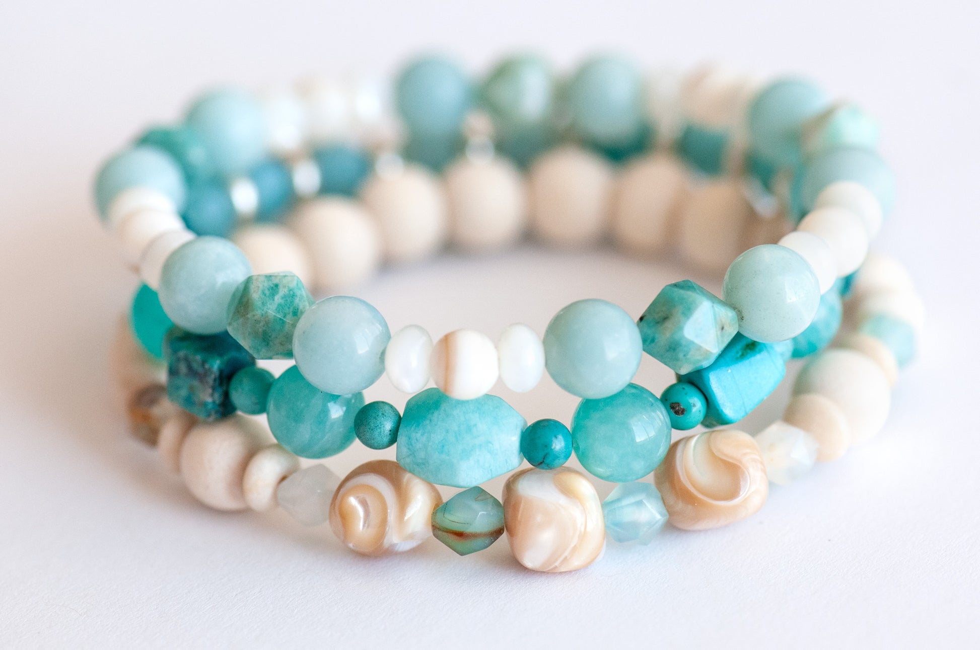 Voyage to Cuba bracelet set inspired by the beaches, sea, and sky of Cayo Cruz, featuring Amazonite, Chrysocolla, Fossil Stone, and Trocca Shell. A tropical getaway in every bead.