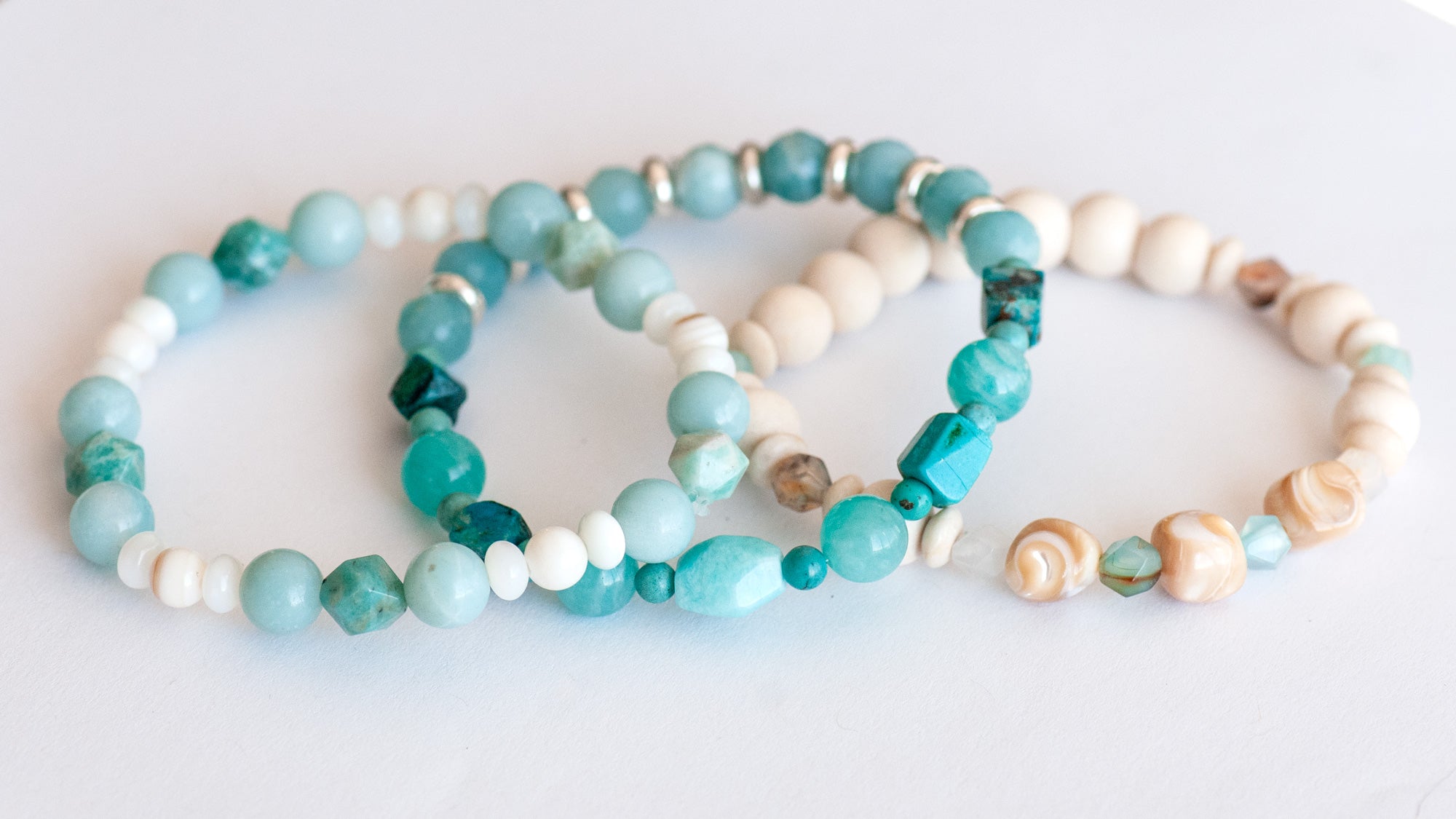 Voyage to Cuba bracelet set inspired by Cayo Cruz, featuring Amazonite, Chrysocolla, Fossil Stone, and Trocca Shell