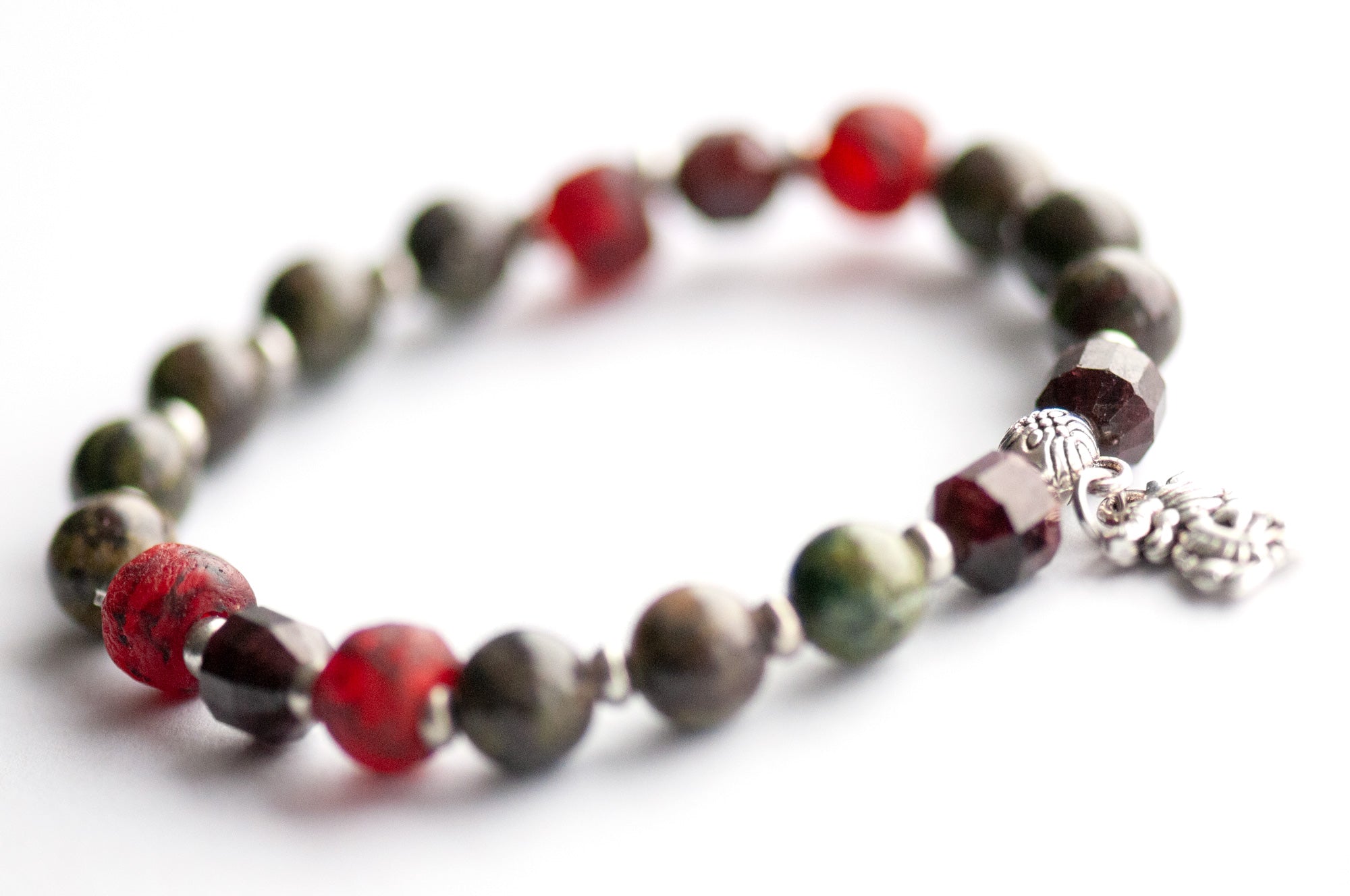 Flameborne Dragon bracelet set with Dragonblood Jasper, Garnet, Red Tiger Eye, Tiger Iron, and dragon charm – handcrafted by Fierce Lynx Designs