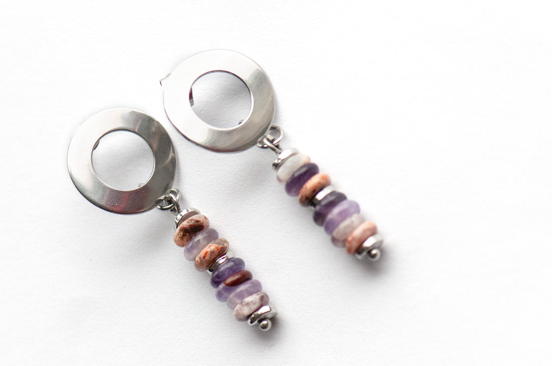 Delicate stud earrings with Dog Teeth Amethyst and silver accents. Lightweight and modern with a touch of mystical elegance—perfect for everyday wear.