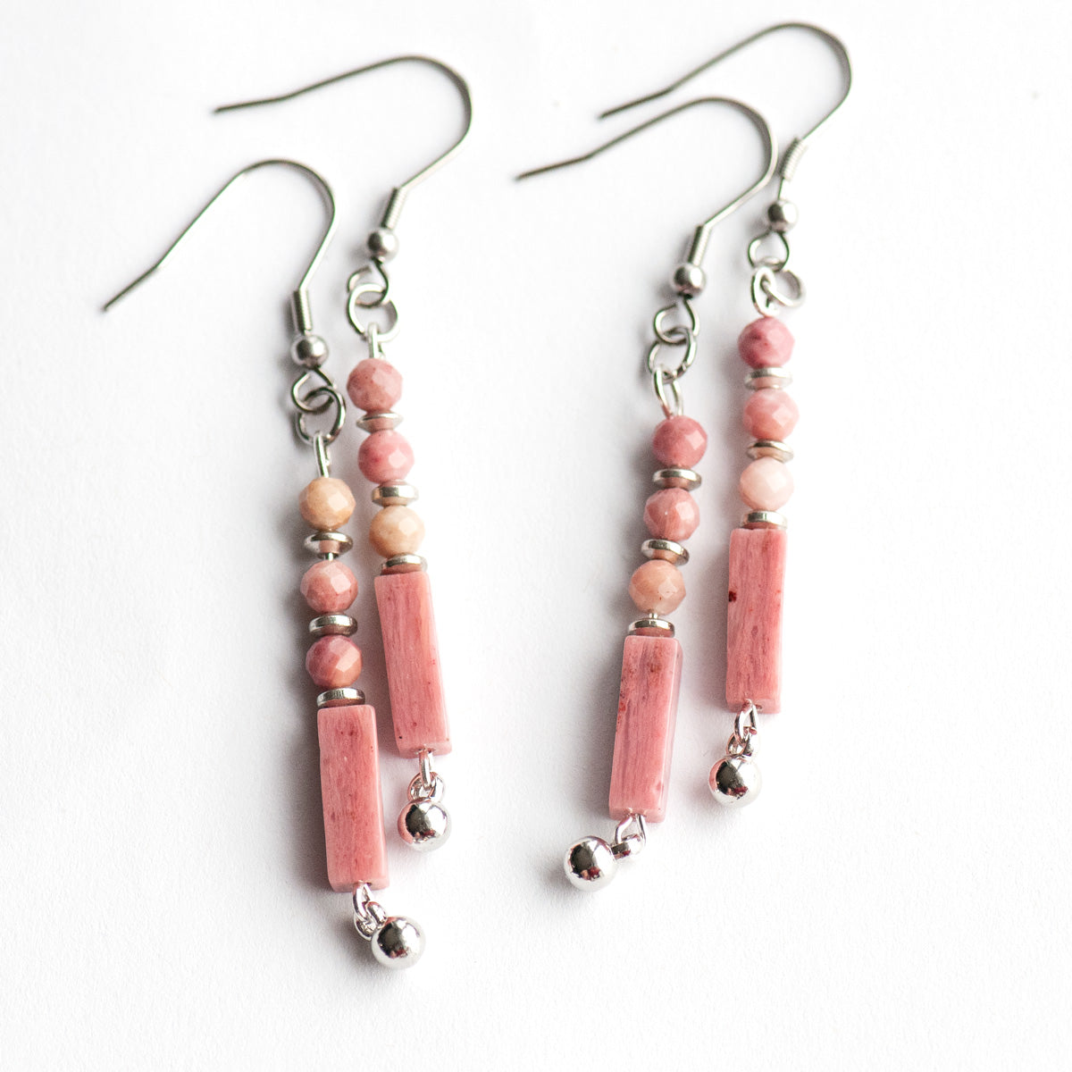 These delicate Rhodonite earrings feature ombré pink tones, micro-faceted beads, and silver accents. They are lightweight, elegant, and perfect for everyday wear.