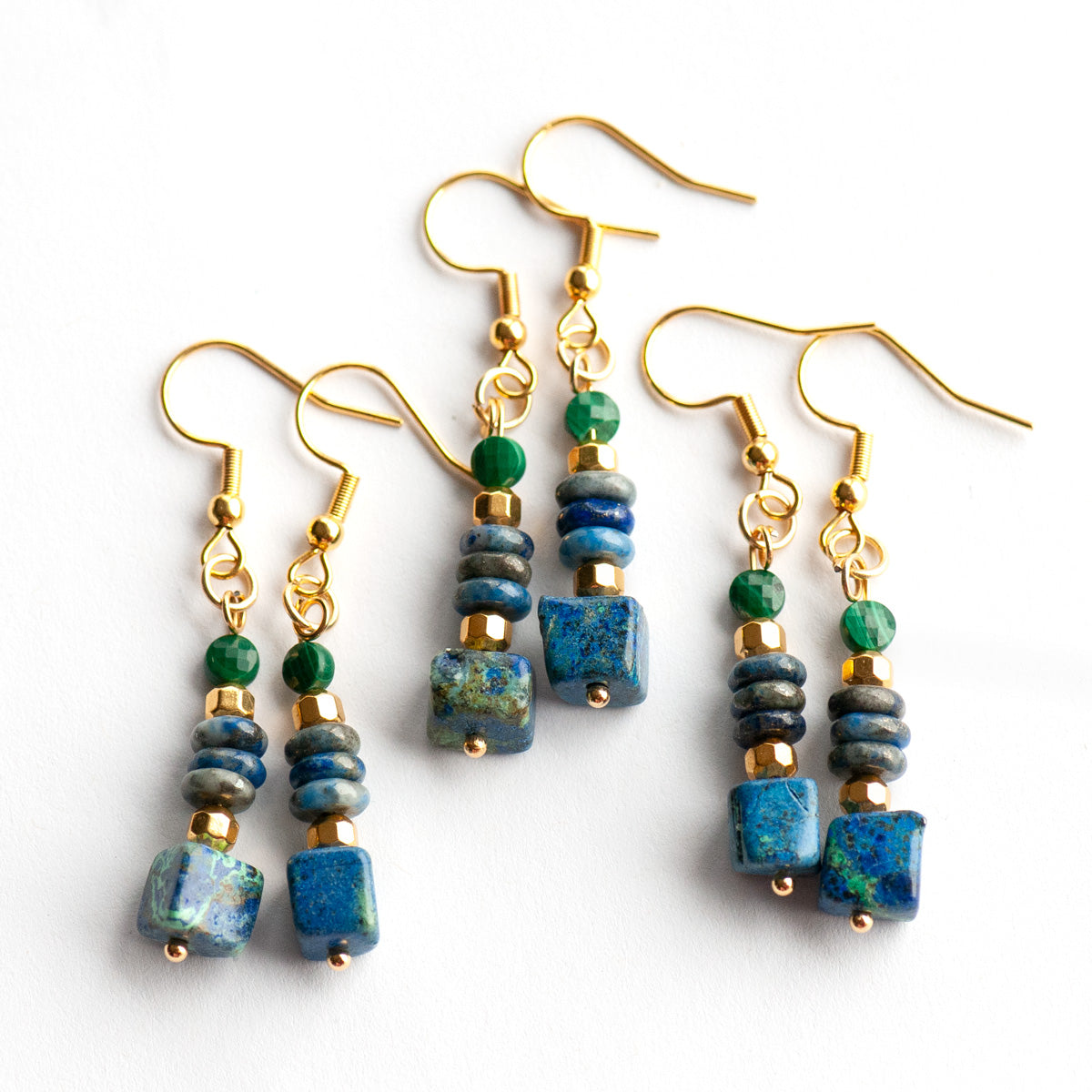 Elegant gemstone earrings featuring Azurite, Malachite, and Lapis with gold-plated accents. A mystical, lightweight design for everyday magic and style.