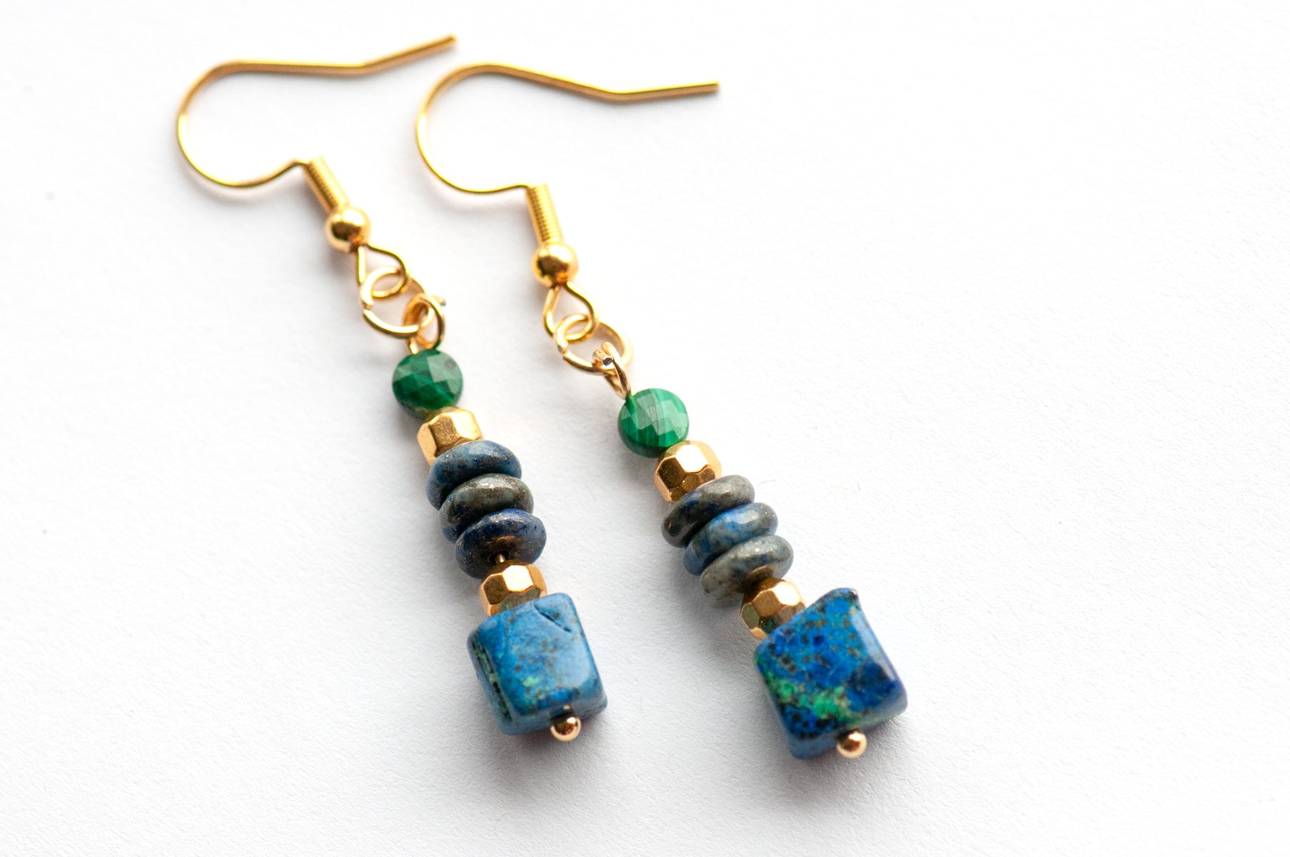 Elegant gemstone earrings featuring Azurite, Malachite, and Lapis with gold-plated accents. A mystical, lightweight design for everyday magic and style.