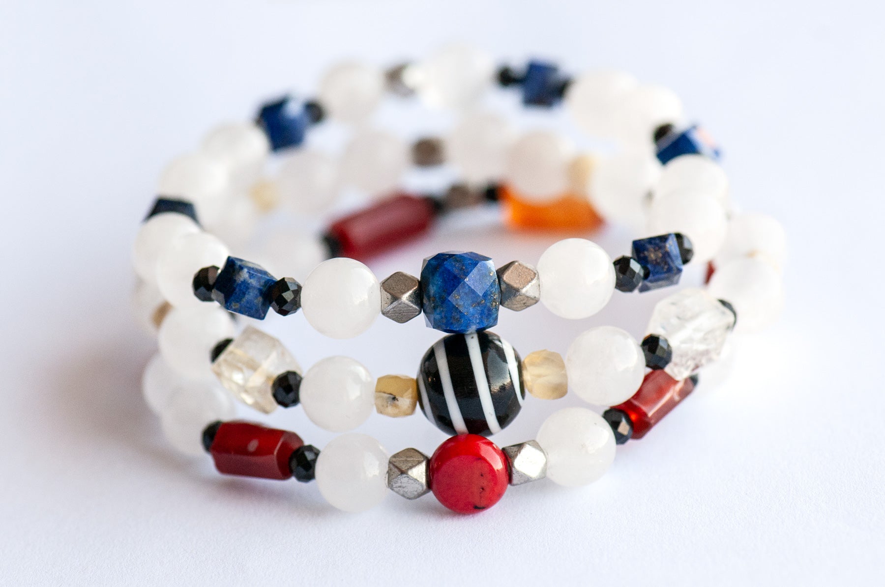 Mondrian Lynx bracelet set featuring Lapis, Carnelian, Citrine, and White Jade gemstones