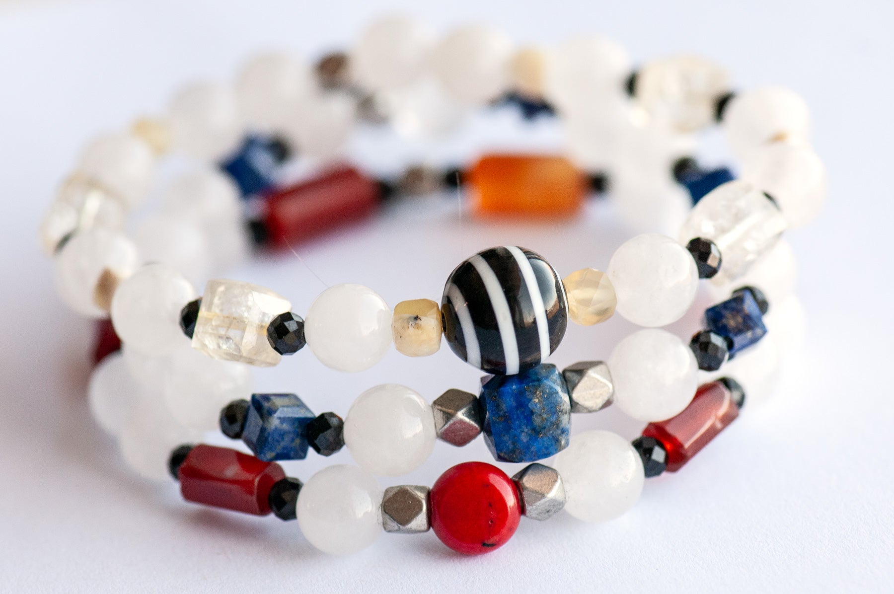 Mondrian Lynx bracelet set featuring Lapis, Carnelian, Citrine, and White Jade gemstones