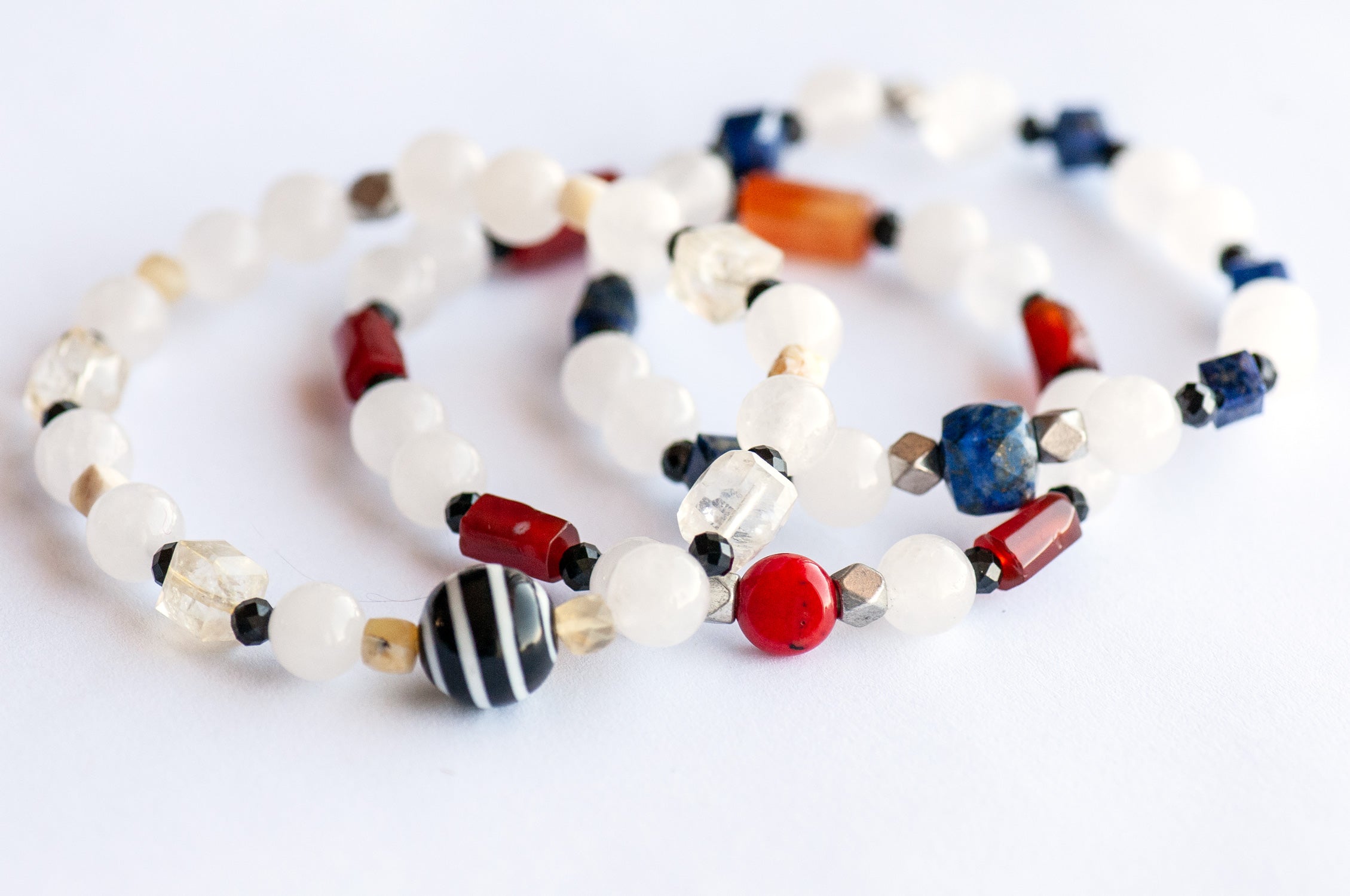 Mondrian Lynx bracelet set featuring Lapis, Carnelian, Citrine, and White Jade gemstones