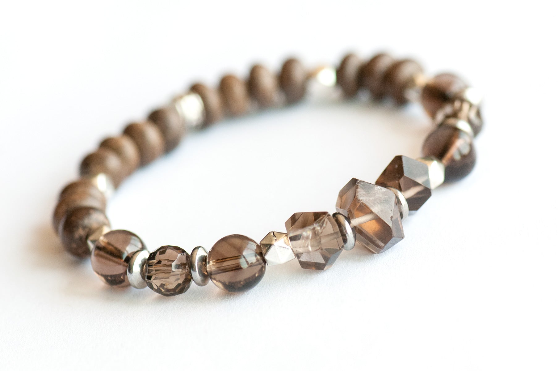 Feature bracelet from New Brunswick Lynx Set – Smoky Quartz nuggets and rounds with grey wood rondelles and silver polygon spacers