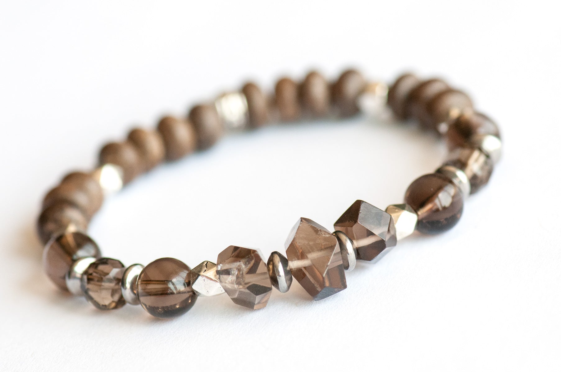 Feature bracelet from New Brunswick Lynx Set – Smoky Quartz nuggets and rounds with grey wood rondelles and silver polygon spacers