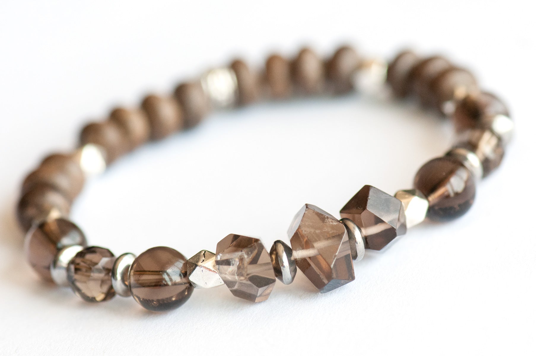 Feature bracelet from New Brunswick Lynx Set – Smoky Quartz nuggets and rounds with grey wood rondelles and silver polygon spacers