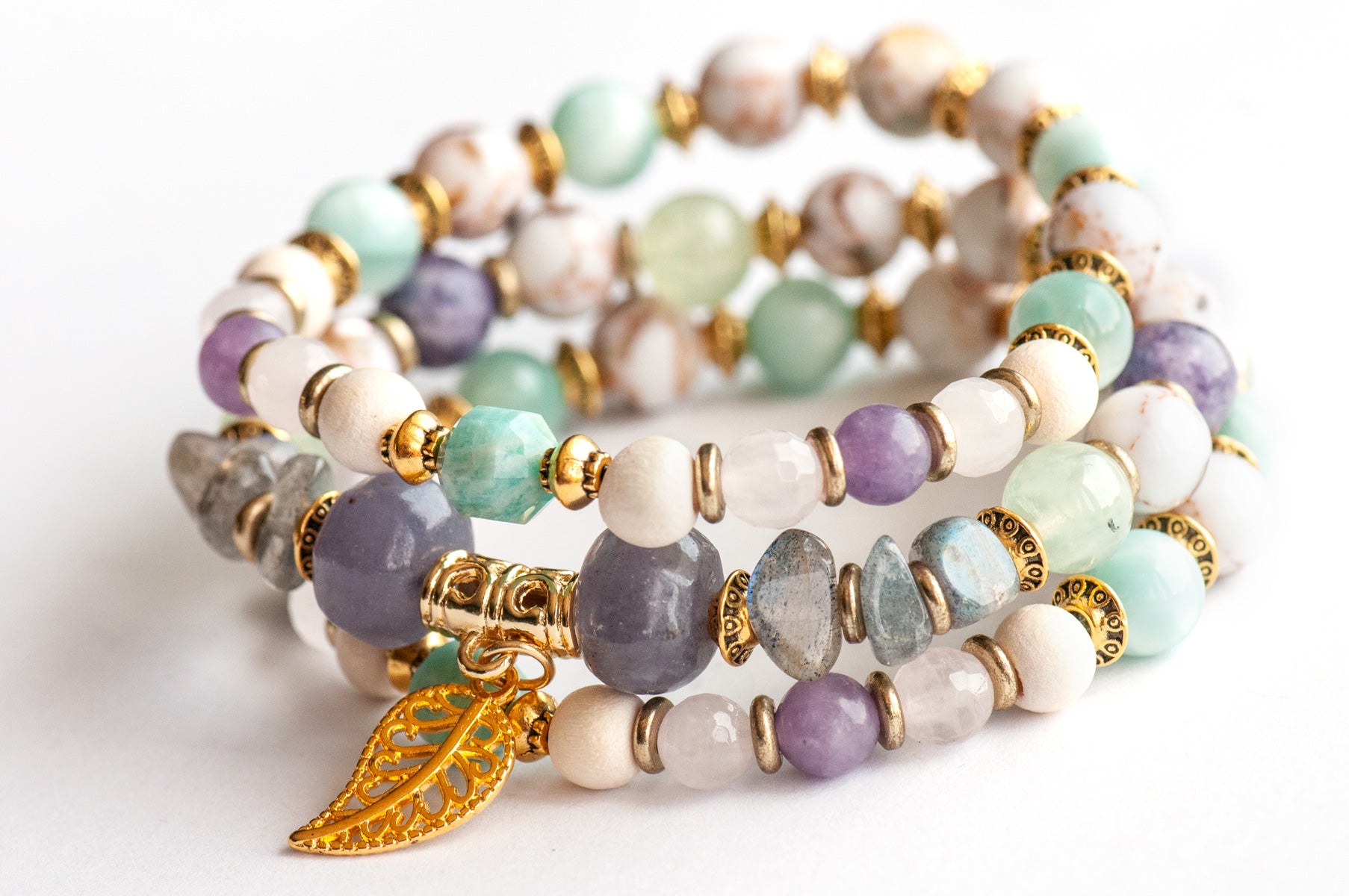 Art Nouveau Lynx bracelet stack featuring Lepidolite, Prehnite, and upcycled shell with gold leaf charm